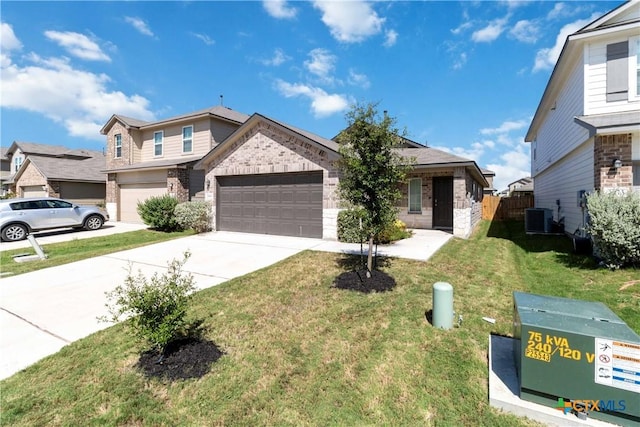 2969 Wolfcreek, New Braunfels, TX 78130 - view of front facade with concrete driveway, brick siding, central AC unit, and an attached garage