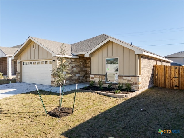 single story home with a garage and a front yard