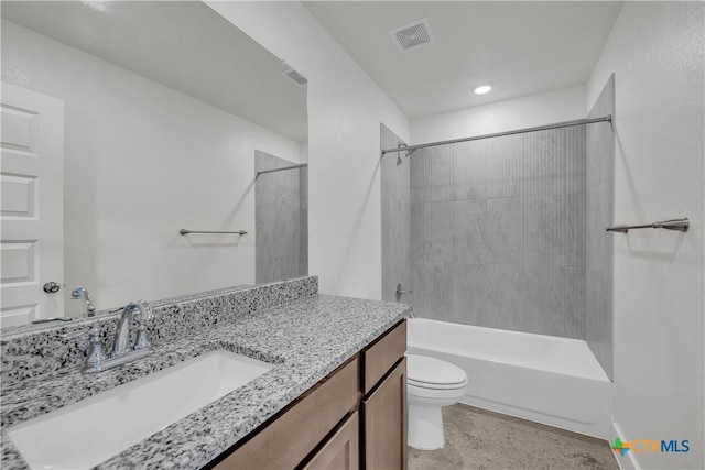 full bathroom with vanity, toilet, and tiled shower / bath combo