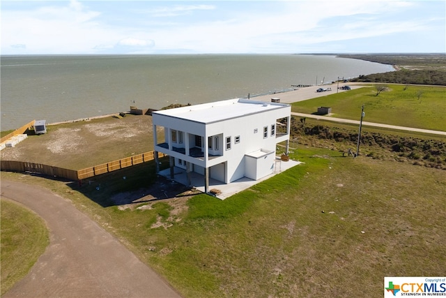 birds eye view of property featuring a water view