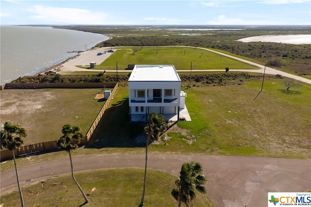 birds eye view of property featuring a rural view and a water view