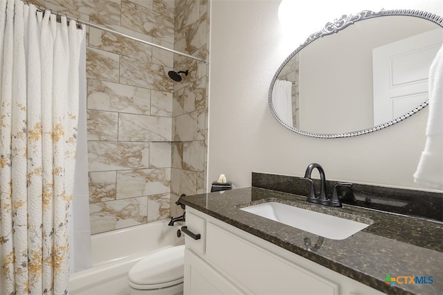 full bathroom with shower / tub combo with curtain, vanity, and toilet