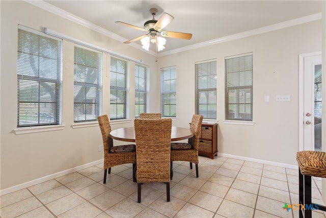 dining area with ornamental molding, ceiling fan, and light tile patterned flooring