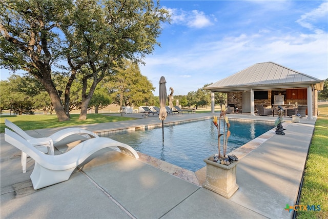 view of pool with a patio area