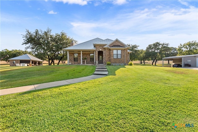 ranch-style house with covered porch and a front lawn