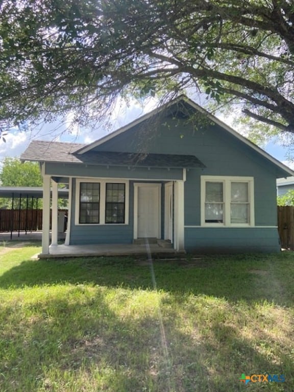 720 S Laurel Ave, Luling, TX 78648 - view of front of house with a porch