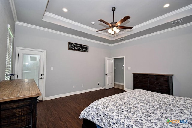 bedroom featuring recessed lighting, dark wood-type flooring, visible vents, a raised ceiling, and crown molding