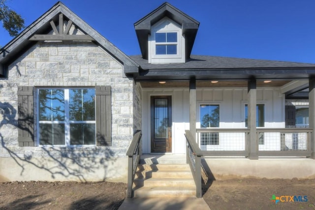 view of front of home featuring covered porch