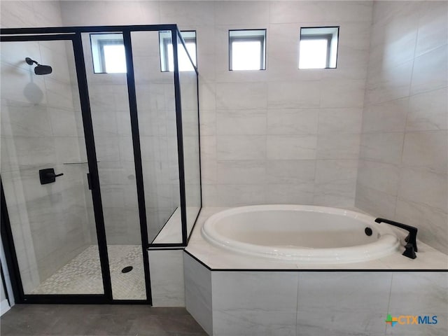 412 Talon, Salado, TX 76571 - bathroom featuring a bath and a shower stall
