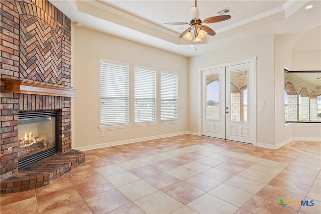 2747 Hester Way, Salado, TX 76571 - entrance foyer with a raised ceiling, plenty of natural light, a ceiling fan, baseboards, and ornamental molding