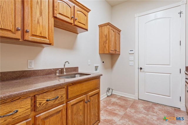 2747 Hester Way, Salado, TX 76571 - washroom featuring electric dryer hookup, cabinet space, washer hookup, and baseboards