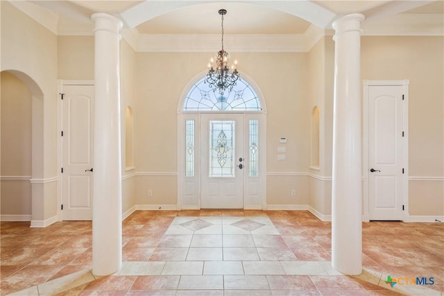 2747 Hester Way, Salado, TX 76571 - entryway featuring ornamental molding, arched walkways, and baseboards