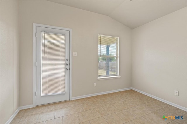 711 Leo Ln, Killeen, TX 76542 - unfurnished room featuring lofted ceiling and light tile patterned floors