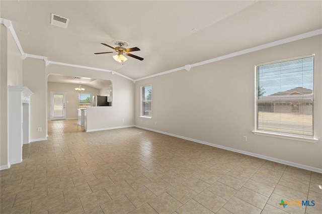 711 Leo Ln, Killeen, TX 76542 - unfurnished living room featuring arched walkways, ceiling fan, ornamental molding, and a chandelier
