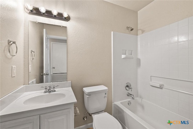 711 Leo Ln, Killeen, TX 76542 - bathroom with washtub / shower combination, vanity, and a textured wall