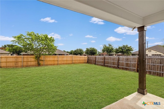 711 Leo Ln, Killeen, TX 76542 - fenced backyard with a patio area