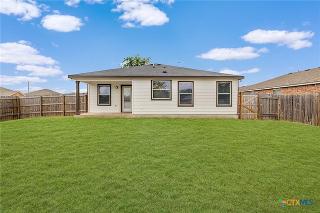 711 Leo Ln, Killeen, TX 76542 - back of property with a fenced backyard and a patio area