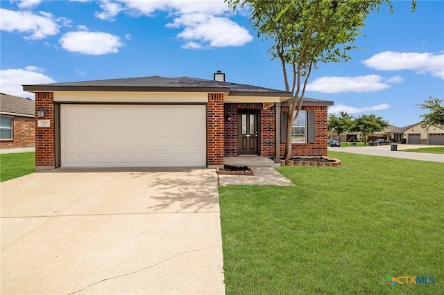 711 Leo Ln, Killeen, TX 76542 - view of front of property featuring concrete driveway, a front yard, brick siding, a garage, and a chimney