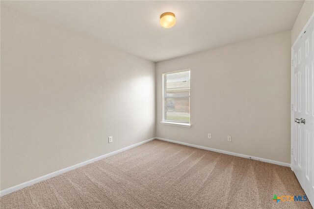 711 Leo Ln, Killeen, TX 76542 - unfurnished bedroom featuring carpet floors