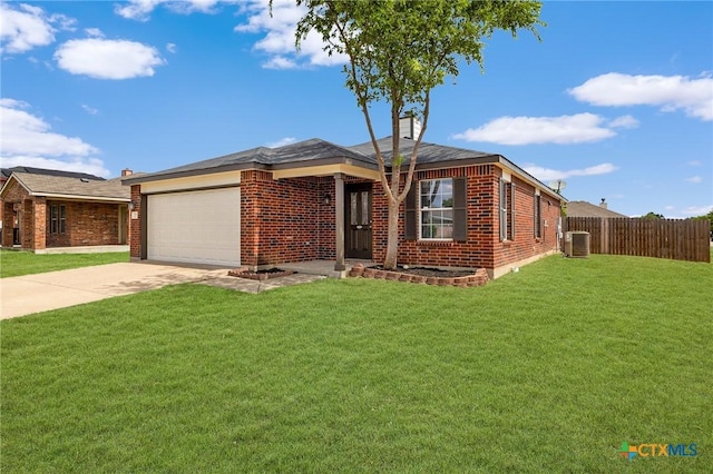 711 Leo Ln, Killeen, TX 76542 - single story home with driveway, brick siding, and a garage