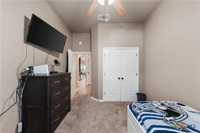 3308 Ten Bits Dr, Belton, TX 76513 - bedroom with light colored carpet, a closet, and a ceiling fan