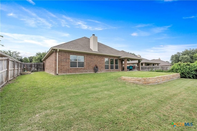 3308 Ten Bits Dr, Belton, TX 76513 - back of house with brick siding, a chimney, and a shingled roof