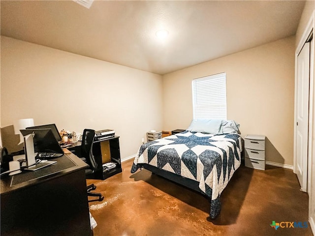 carpeted bedroom featuring a closet