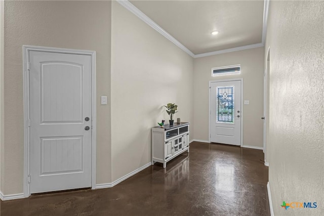 1703 Fossil Trl, Belton, TX 76513 - entrance foyer with crown molding, baseboards, and concrete floors