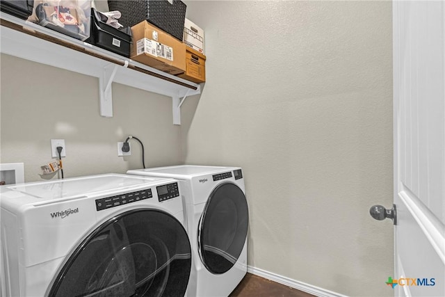 1703 Fossil Trl, Belton, TX 76513 - laundry room featuring laundry area, washer and clothes dryer, and baseboards