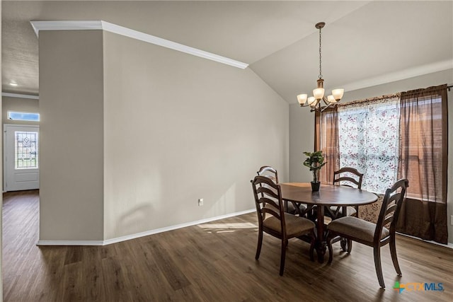 1703 Fossil Trl, Belton, TX 76513 - dining area featuring wood finished floors, a chandelier, ornamental molding, and lofted ceiling