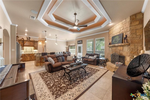 3201 Purple Sage Dr, Belton, TX 76513 - living area with a raised ceiling, ornamental molding, ceiling fan, and visible vents