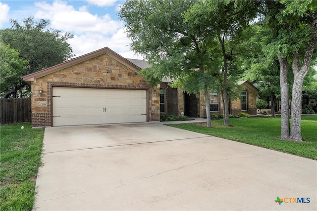3201 Purple Sage Dr, Belton, TX 76513 - single story home with fence, brick siding, a garage, a front yard, and concrete driveway