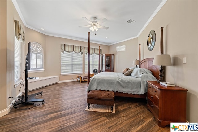 bedroom with crown molding, ceiling fan, and dark hardwood / wood-style floors