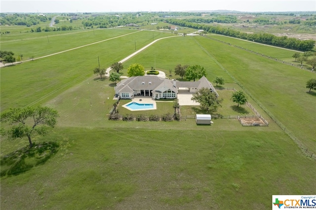 birds eye view of property featuring a rural view