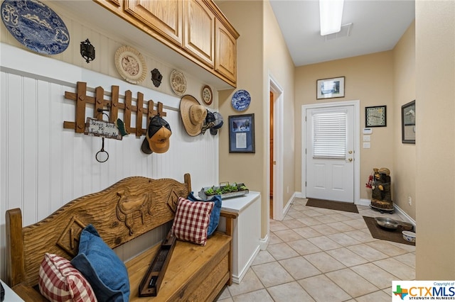 mudroom featuring light tile patterned floors