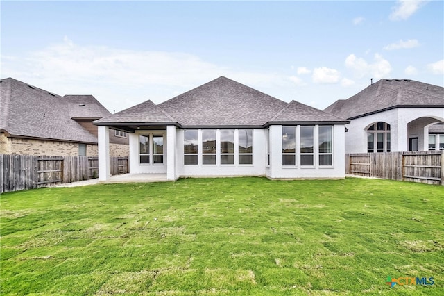 1923 Privet Rd, New Braunfels, TX 78132 - rear view of house featuring roof with shingles, a patio, and a fenced backyard