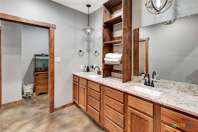 1622 Old Goliad Rd, Victoria, TX 77905 - full bathroom featuring baseboards, double vanity, and toilet