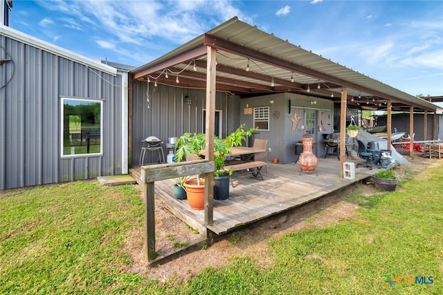 1622 Old Goliad Rd, Victoria, TX 77905 - wooden deck with a yard and outdoor dining area