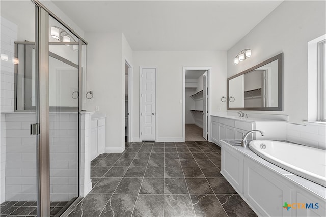 bathroom with vanity and plus walk in shower