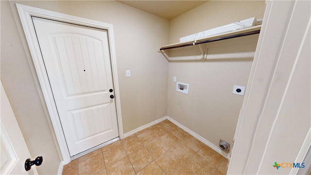 clothes washing area featuring washer hookup, electric dryer hookup, and light tile patterned floors