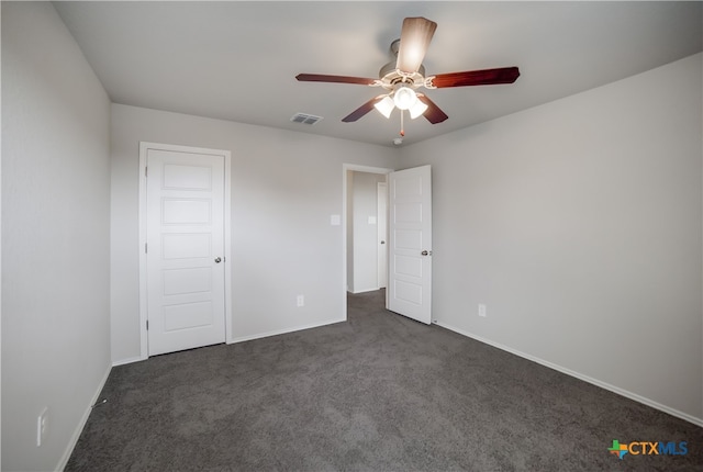 7147 Azure Waters, Converse, TX 78109 - unfurnished bedroom with dark carpet and ceiling fan