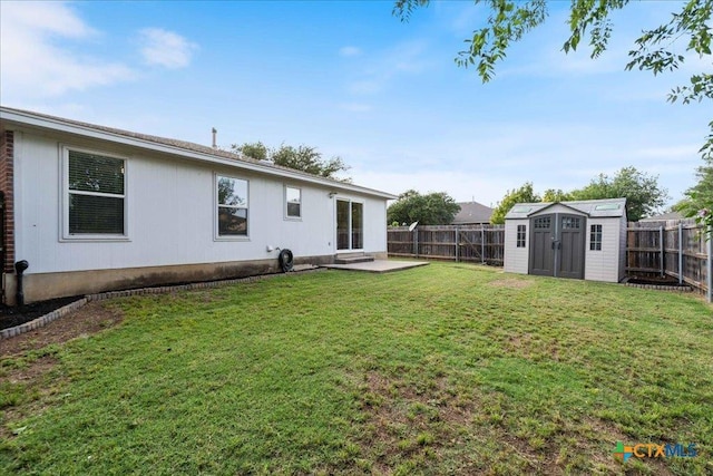 2102 Garrison Dr, Leander, TX 78641 - fenced backyard featuring a shed and a patio area