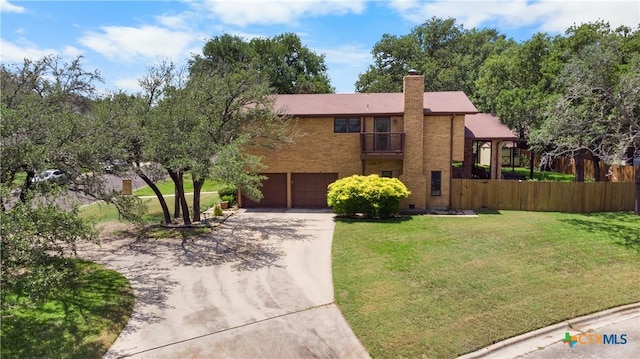 2106 Antelope Trl, Harker Heights, TX 76548 - view of front facade featuring driveway, a balcony, an attached garage, a chimney, and brick siding