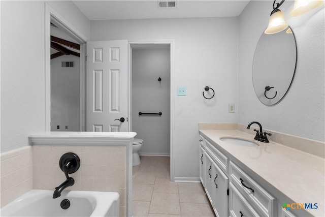 2106 Antelope Trl, Harker Heights, TX 76548 - bathroom featuring a bath, vanity, and tile patterned flooring