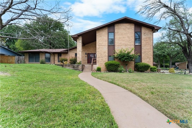 2106 Antelope Trl, Harker Heights, TX 76548 - mid-century home with brick siding and a front lawn