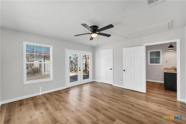 516 Tampico St, Seguin, TX 78155 - full bathroom with a tile shower, vanity, toilet, and wood finished floors