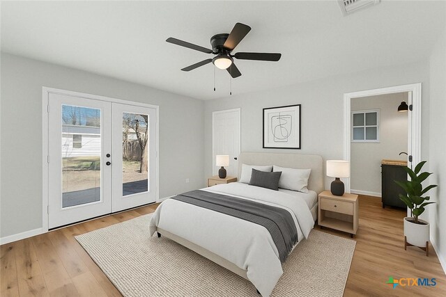 516 Tampico St, Seguin, TX 78155 - unfurnished bedroom with attic access, access to exterior, wood finished floors, and french doors