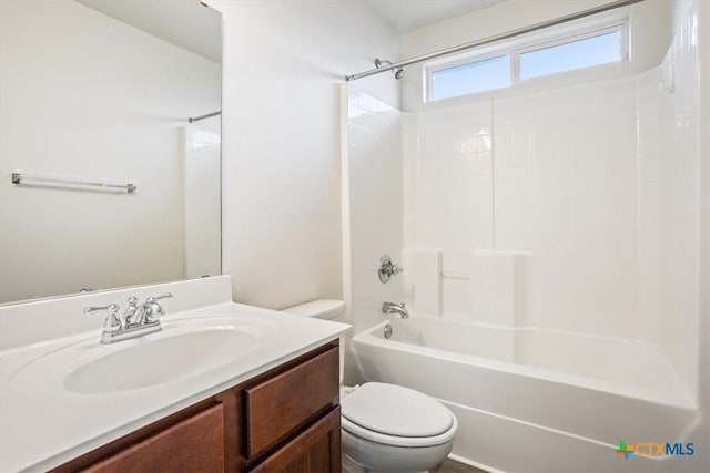 full bathroom with shower / bathing tub combination, toilet, and vanity