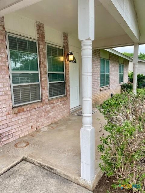 1541 Cologne Dr, New Braunfels, TX 78130 - entrance to property with covered porch and brick siding