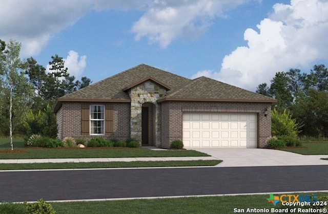 view of front facade with a garage and a front yard